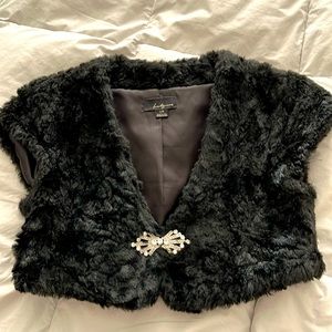 Faux fur shrug topper with art deco clasp